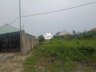 Half plot partly fenced in Abijo Lekki Lagos