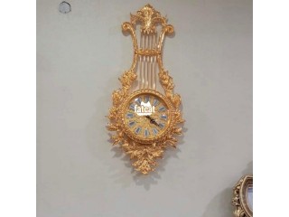 Gold ancient wall clock