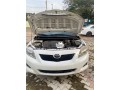 super-clean-white-toyota-corolla-2010-small-2