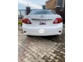 super-clean-white-toyota-corolla-2010-small-1