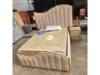 6 by 6 upholstery padded bedframe with oneside drawer